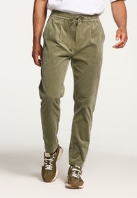 Shiwi CORDUROY RIB - Spodnji deli trenirk - uniform green