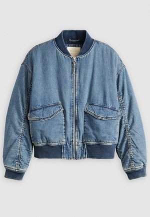 Jeans bomberjakke med ribbestrikket krage og mansjetter, frontåpning med glidelås og to store påsydde lommer. Myk, litt teksturert blått stoff.