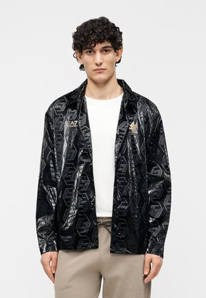 TRAIN SOCCER GRAPHIC EXTRA SHINY  - Let jakke / Sommerjakker - black