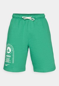 Zöld pamut keverék rövidnadrág, rugalmas derékpánttal és húzózsinórral. Bal lábon fehér Boston Celtics grafika található.