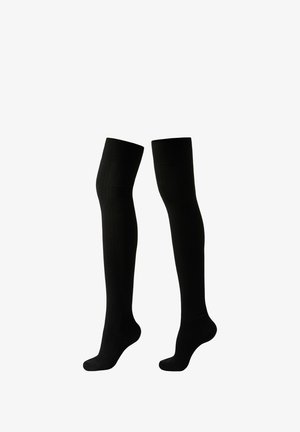 Knæhøje strømper i ensfarvet sort, rillet tekstur og strækbart stof. Har forstærket tå og glat manchet-design.