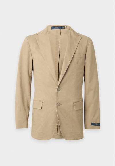 Beige tweeknoopblazer met inkeping revers, klepzakken, borstzak en Polo Ralph Lauren-label aan de binnenkant van de kraag en manchetten.