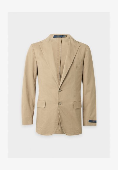 Beige tweeknoopblazer met inkeping revers, klepzakken, borstzak en Polo Ralph Lauren-label aan de binnenkant van de kraag en manchetten.