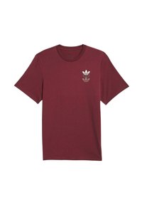 Camiseta de algodón burdeos con mangas cortas, cuello redondo y un logotipo reflectante de tres rayas en el lado izquierdo del pecho. Textura suave.