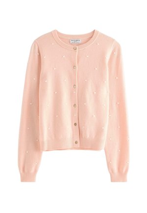 Vaaleanpunainen lyhyt neuletakki, jossa on pyöreä kaulus, pieniä kohotettuja pisteitä, virkattu hihansuut ja helma sekä kuusi napinläpeä edessä.