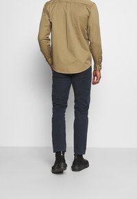 KnowledgeCotton Apparel Chino kalhoty - dark blue