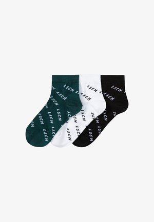 Three pairs of crew socks in dark green, white, and black. Each sock features the text "LSCN" in a contrasting color pattern.