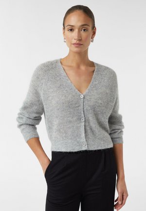Light gray cardigan with a V-neck, button front, and ribbed cuffs. Soft texture, cropped design, and slight fuzziness visible.