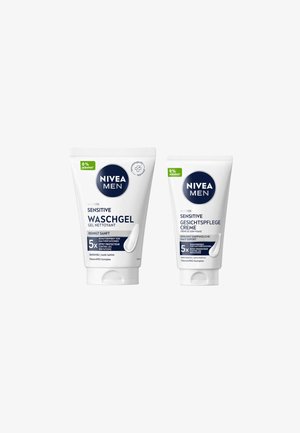 NIVEA MEN Sensitive twin set: white plastic tubes with blue and green accents; includes wash gel and face cream, both labeled "0% Alcohol."