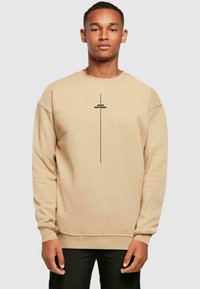 Merchcode THINK DIFFERENT - Sweatshirt - unionbeige