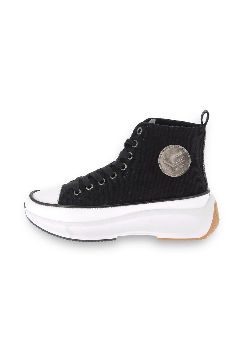 High-top sneakers with a black corduroy upper, white rubber toe cap, and a textured white midsole. Features a logo patch and black laces.