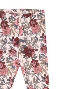 Leggings con uno sfondo crema e un denso motivo di stampe floreali in rosa, bordeaux e grigio con foglie verdi.