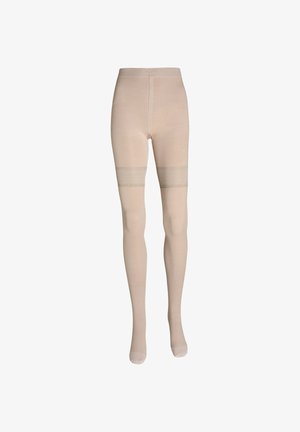 Beige compressiekousen met verstevigde banden rond de bovenbenen, die van de taille tot de tenen reiken op een witte achtergrond.