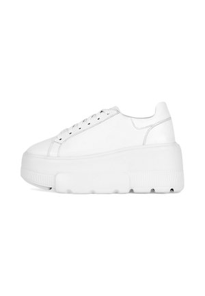 White platform sneaker with thick textured sole, lace-up front, and smooth upper, shown in side profile on a white background.
