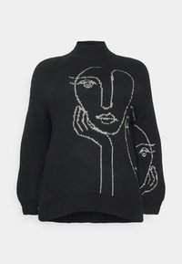 Pull en tricot noir présentant un design de visage et de main dessiné à la ligne blanche. Il a un col haut et des manches amples, créant un aspect texturé.