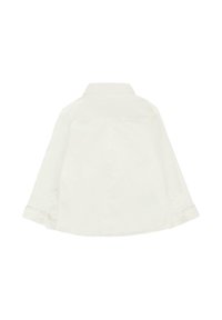 Camicia bianca in cotone con bottoni, caratterizzata da maniche lunghe, colletto classico e cucitura sul retro, con bottoni ai polsini.