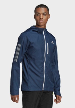 OWN THE RUN HOODED WINDBREAKER - Training jacket - blue