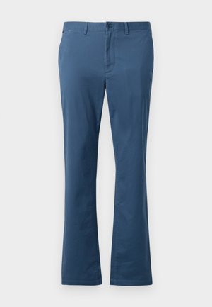 Blaue Baumwollhose im geraden Schnitt, mit Knopfverschluss und Gürtelschlaufen. Glatte Textur und minimale Nähte.