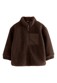 Veste en polaire marron avec un col montant, une fermeture éclair à l'avant et une poche poitrine. Texture douce, coupe oversize, couleur marron unie sur toute la surface.