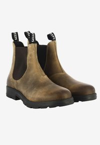 Stivaletti Chelsea in pelle marrone con pannelli elastici neri e linguette, con una superficie liscia e punta rotonda, su una suola in gomma.