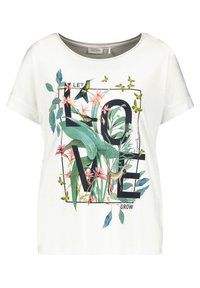 Hvid bomulds-T-shirt med en afslappet pasform, der har et levende grafikdesign i grøn, pink og sort af tropiske blade, blomster og dyr.
