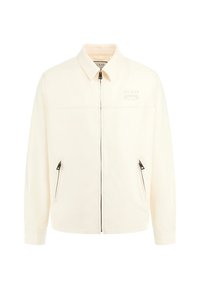 Cream-colored jacket with a zip front, collared neck, two diagonal pockets, and subtle logo detail above the left pocket. Smooth texture.