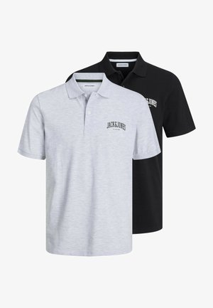Two polo shirts: one light gray with a small logo, one black. Both feature a classic collar, short sleeves, and soft fabric.