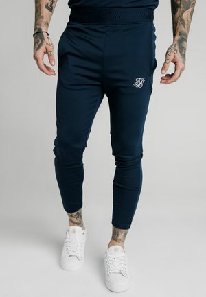 AGILITY TRACK PANTS - Verryttelyhousut - navy