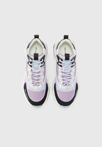 Purple mesh sneakers with black accents, reflective detailing, and a thick sole. Features laces and a loop for easy wear.