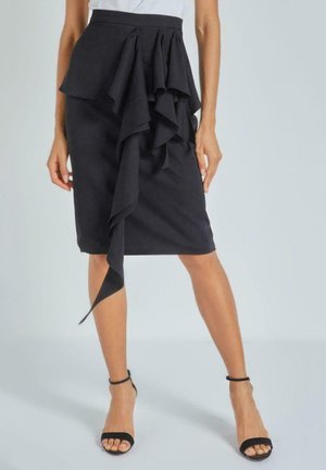 CON DETALLE DE VOLANTE - Falda de tubo - black