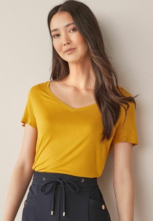 Next SLOUCH V NECK - Lihtne T-särk - yellow