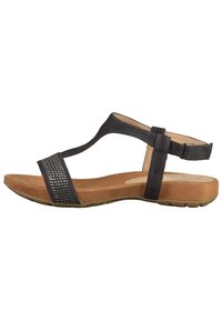 Svart mockaskandal med T-remdesign, prydd med rhinestones. Dämpad innersula och slitstark gummisula, med spänne.