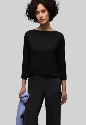 - Bluzka z długim rękawem