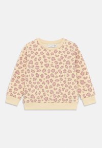 Felpa gialla con stampa leopardata rosa, caratterizzata da un collo a giro e polsini a coste. Tessuto morbido con una consistenza liscia.