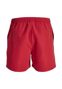 Rode zwemshorts met een elastische tailleband, effen kleur en een lichtgewicht stof. Het ontwerp heeft zijzakken en een simpele snit.