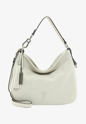 Bolso de mano de cuero blanco perforado con forma curva, detalles en negro, una correa de hombro desmontable y un diseño decorativo de borlas.