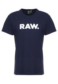 Marinblå bomullströja med rund hals, korta ärmar och stor vit text som står "RAW." på framsidan. Slät textur.