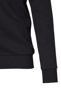 Sort sweatshirt med en glat struktur, ribbede ærmer og en lige kant. Materialet ser blødt ud og er velegnet til afslappet brug.