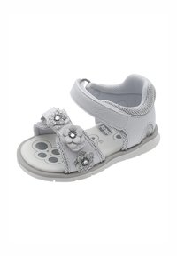 Sandalo bianco con decorazioni floreali, cinturini in Velcro e dettagli in rete. Soletta testurizzata e suola in gomma, progettato per comfort e supporto.