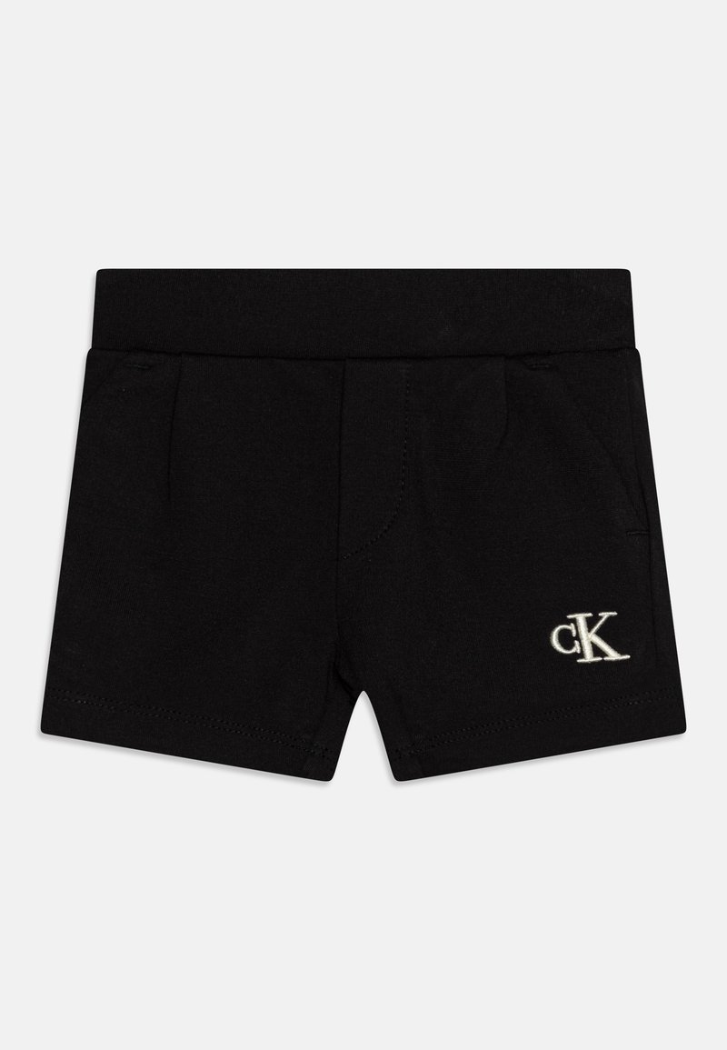 Černé bavlněné šortky s elastickým pasem, bočními kapsami a malým vyšitým logem na přední straně. Hladký povrch, minimalistický design.