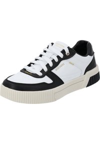 White and black sneaker with a textured leather upper, featuring a ridged rubber sole and gold logo accents on the side and tongue.