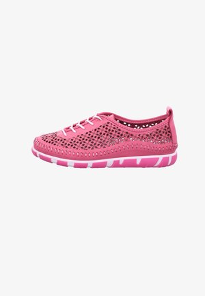 Pink casual shoe with white laces, geometric cut-out patterns, white and pink stitched sole, and low ankle design.