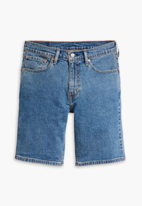 Jeansshorts i ljusblått, med en klassisk fem-fickorsdesign, mässingsbeslag och fransad fåll. Kan tvättas i maskin.