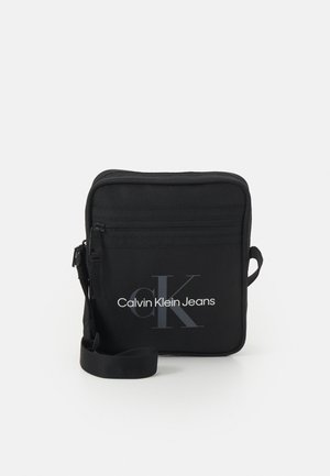 ESSENTIALS REPORTER UNISEX - Geantă crossbody - black