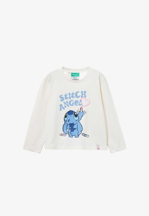 Biała koszula z długim rękawem z niebieską postacią z kreskówek i napisem "STITCH ANGEL" w niebieskim kolorze, z różowymi i białymi akcentami. Miękki materiał bawełniany.