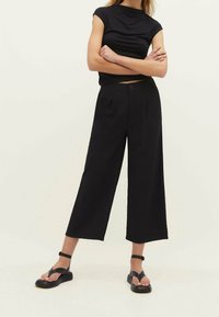 Stradivarius Broek - black