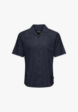 Trumpas rankovėmis, su apykakle tamsiai mėlynas lininis marškiniai. Su mygtukų užsegimu priekyje, su lygia tekstūra ir subtiliu blizgesiu.