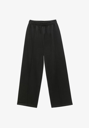 Schwarze weit geschnittene Hose mit einem dehnbarem Bund, hergestellt aus weichem Stoff. Verfügt über flache Vordernähte und keine Taschen. Eignet sich für legere Anlässe.