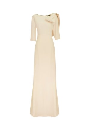 Kremowa długa sukienka z rękawami do połowy łokcia i dużą ozdobną kokardą na lewym ramieniu.