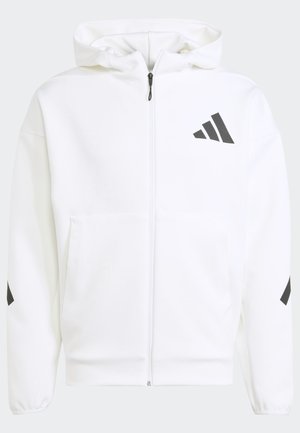 Hvid zip-up hættejakke med hætte. Har sort logo og accenter på skuldrene. Fremstillet af blødt materiale med glat tekstur. Foran er der lommer.